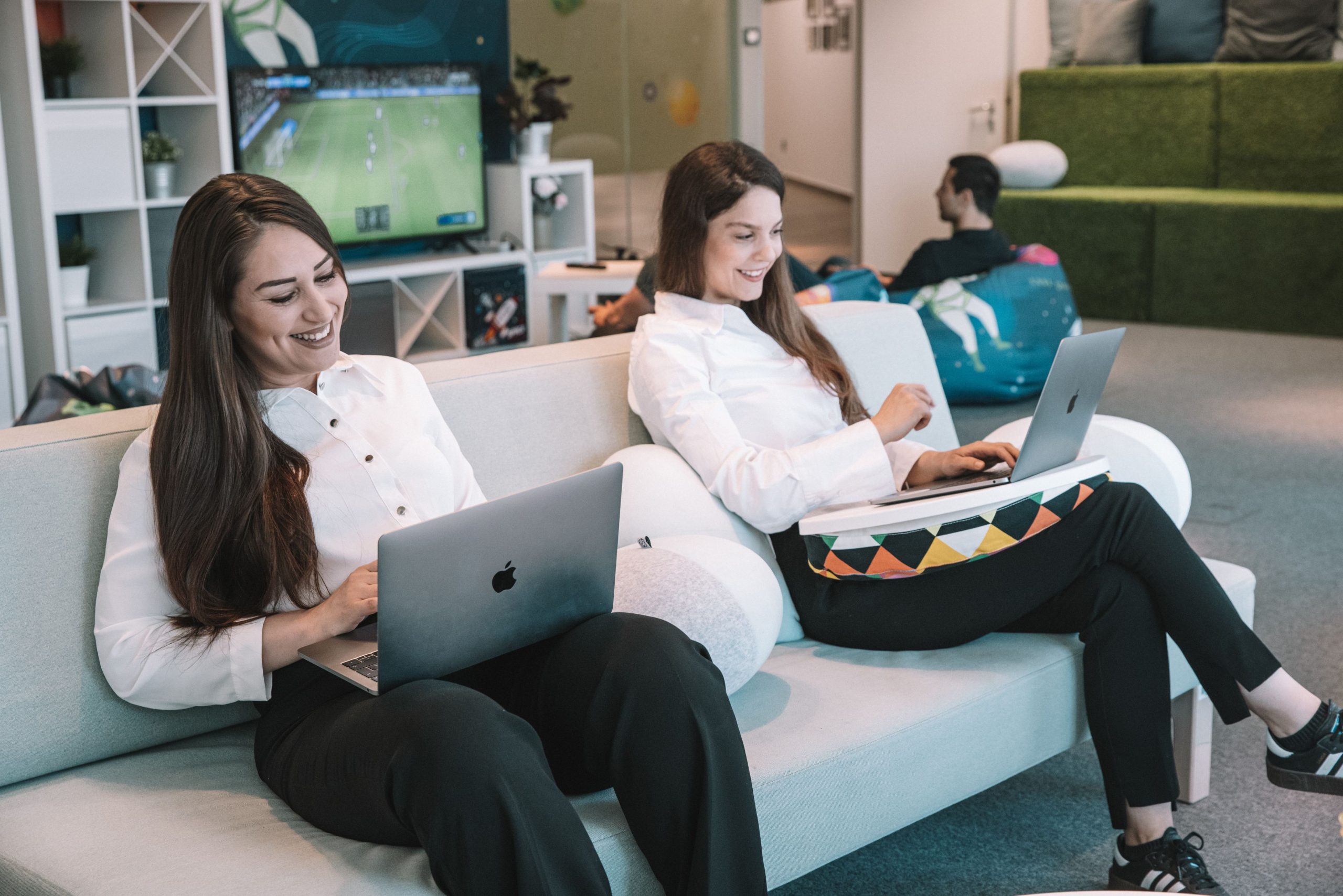 Girls working on sofa