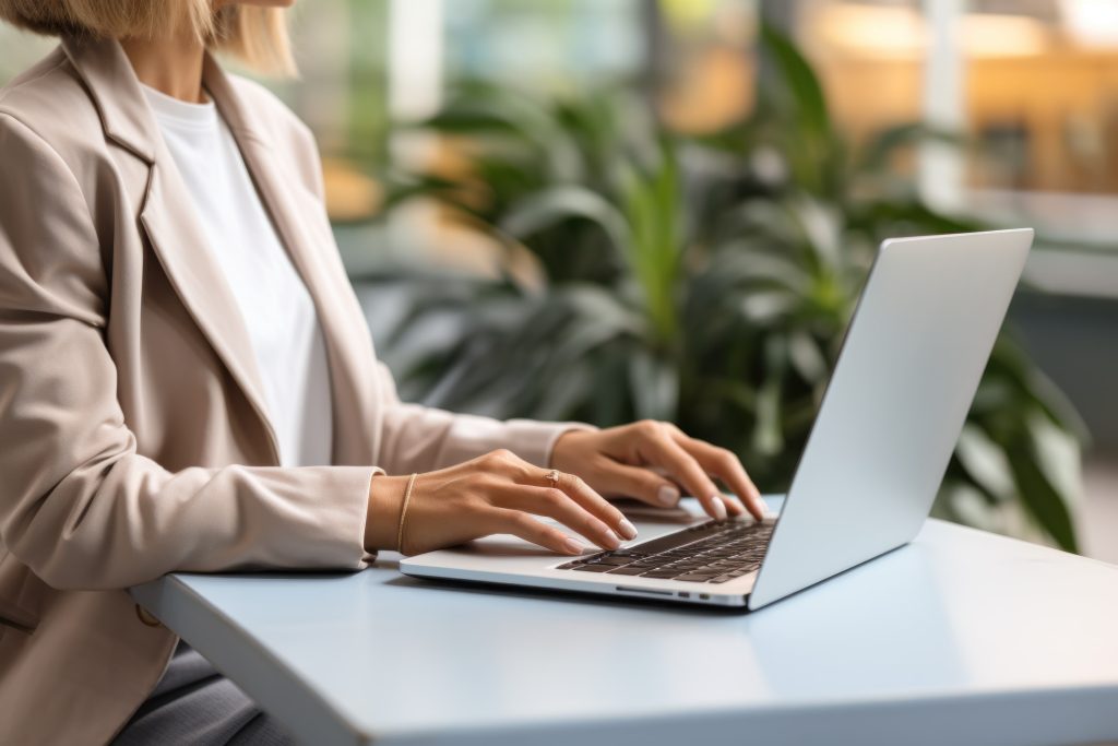 A woman working on low coding solutions